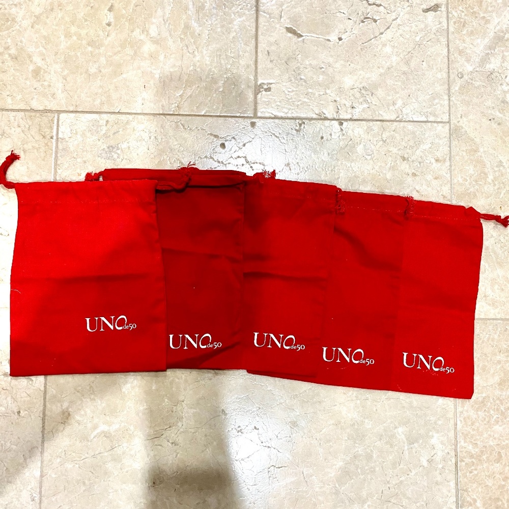 LOT of five LARGE UNO DE 50 duster bags